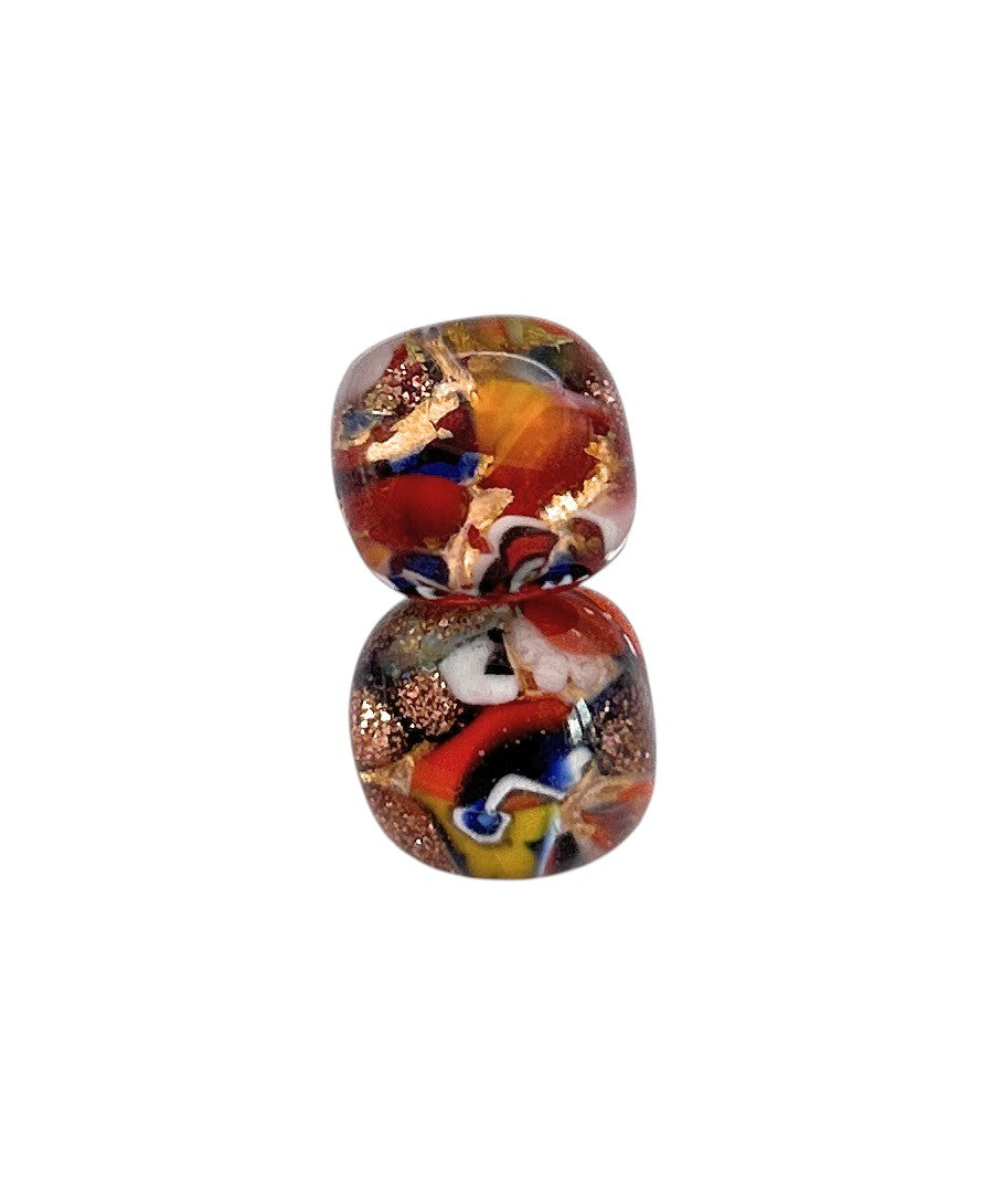 Two vibrant Murano Passion earrings, each 1cm in diameter, feature abstract red, blue, yellow, white, and gold patterns on gold leaf. These Murano Glass Earrings (MGE2) are displayed against a white background.