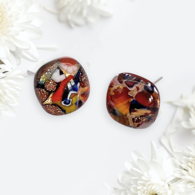 Add Venetian flair to your look with Murano Passion's Murano Glass Earrings (MGE2): multi-colour accents on gold leaf, 1cm diameter. Handcrafted elegance inspired by Venice’s artistry.