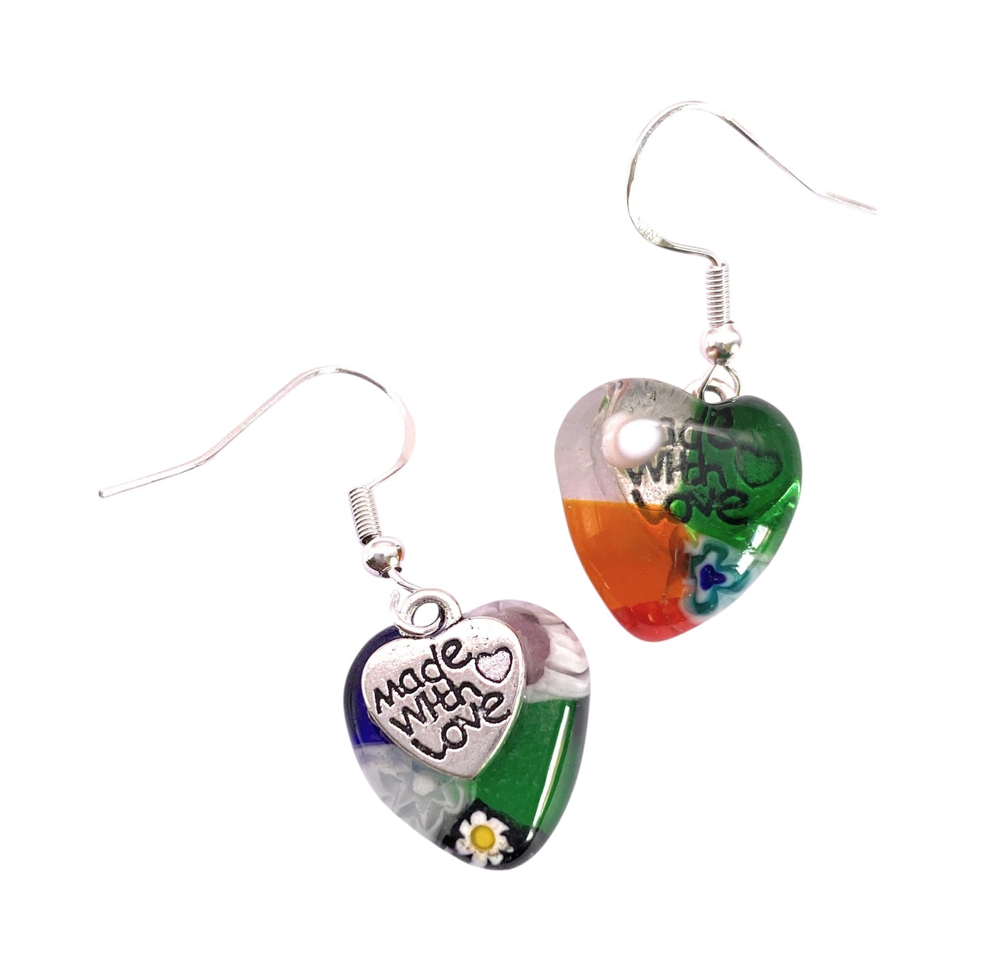 Murano Passion Murano Glass Earrings (MGE24) feature heart-shaped Millefiori glass in green, blue, and orange with flower accents, "Made with Love" silver charms, and 925 sterling silver hooks. Handmade in Venice, Italy. Size: 1.5cm x 1.6cm.