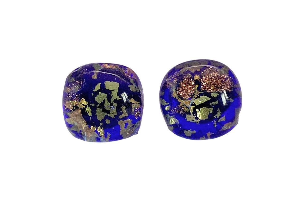 Murano Passion Murano Glass Earrings (MGE16) feature two round, polished blue stones with gold and copper flecks, handcrafted to resemble authentic Murano Glass; each earring has a 1cm diameter and is displayed on a white background.