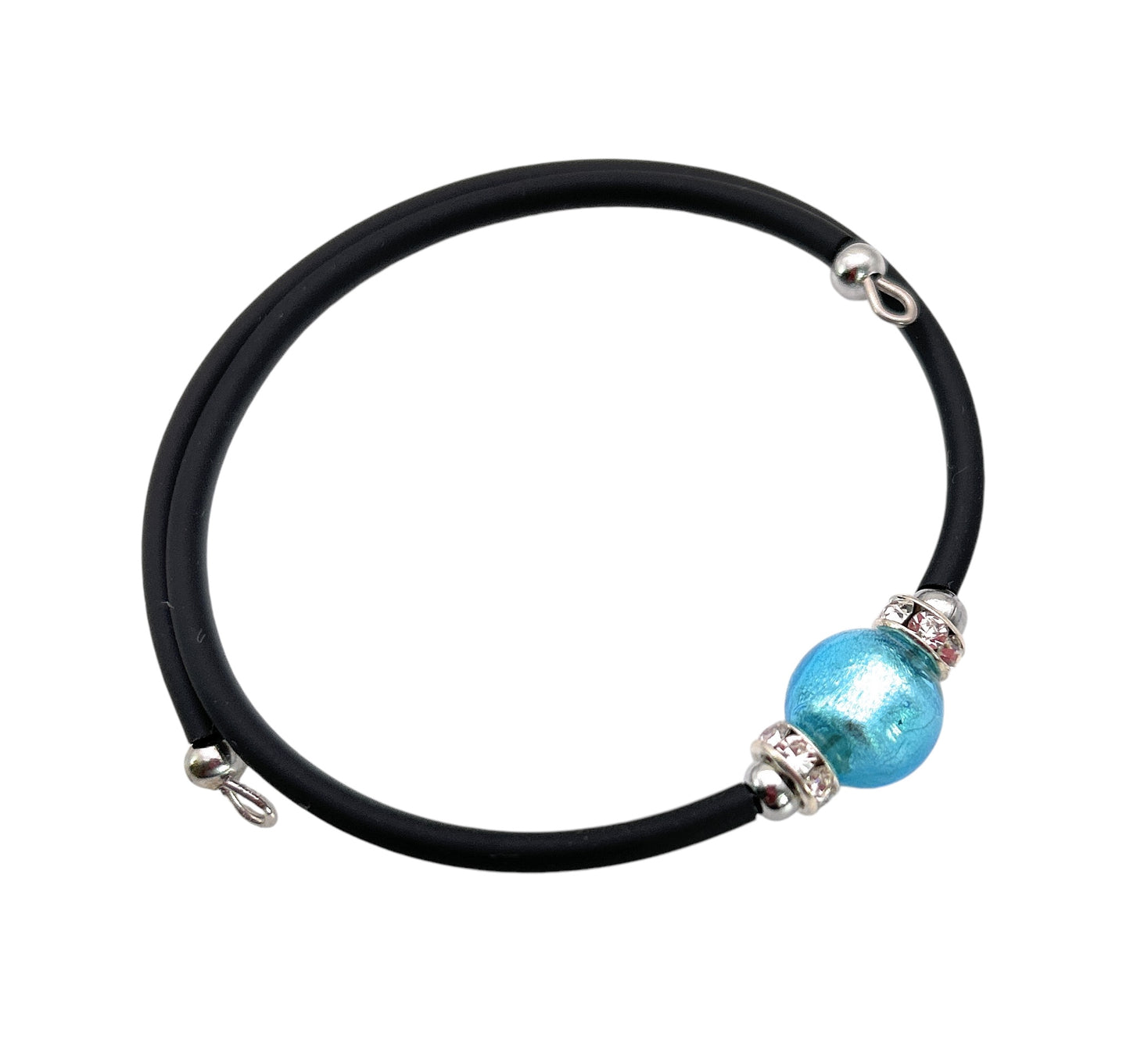 Introducing the Murano Passion Murano Glass Bead Bracelet, a sophisticated piece featuring a 1cm blue bead crafted from Murano Glass. Its elegant design is accentuated with silver accents, capturing the timeless charm of Murano Glass Jewellery for an enduring style statement.