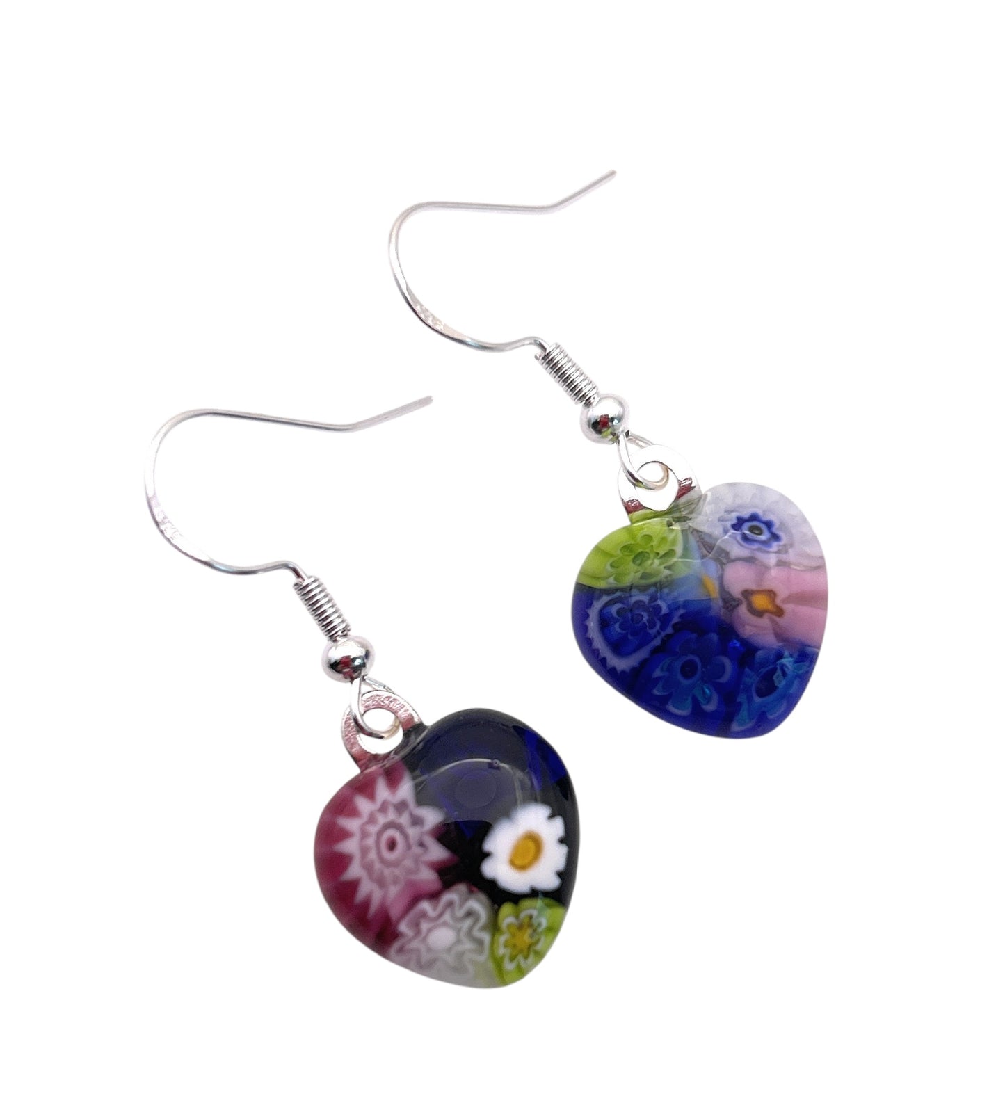 Murano Passion's Murano Glass Earrings are crafted from Millefiori glass featuring multicolored floral designs in blue, pink, green, and white. These dainty 1.4cm x 1.4cm heart-shaped earrings come with elegant 925 sterling silver hooks.