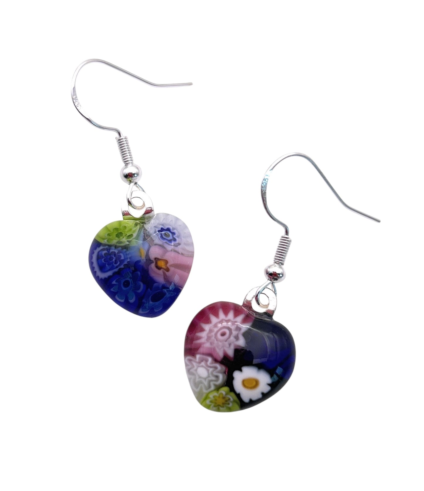The Murano Passion Millefiori Glass Flower Earrings are vibrant heart-shaped pieces with intricate floral patterns in blue, pink, green, and white on a plain white background. Crafted from Murano Glass, they feature 925 sterling silver hooks and measure 1.4cm x 1.4cm.