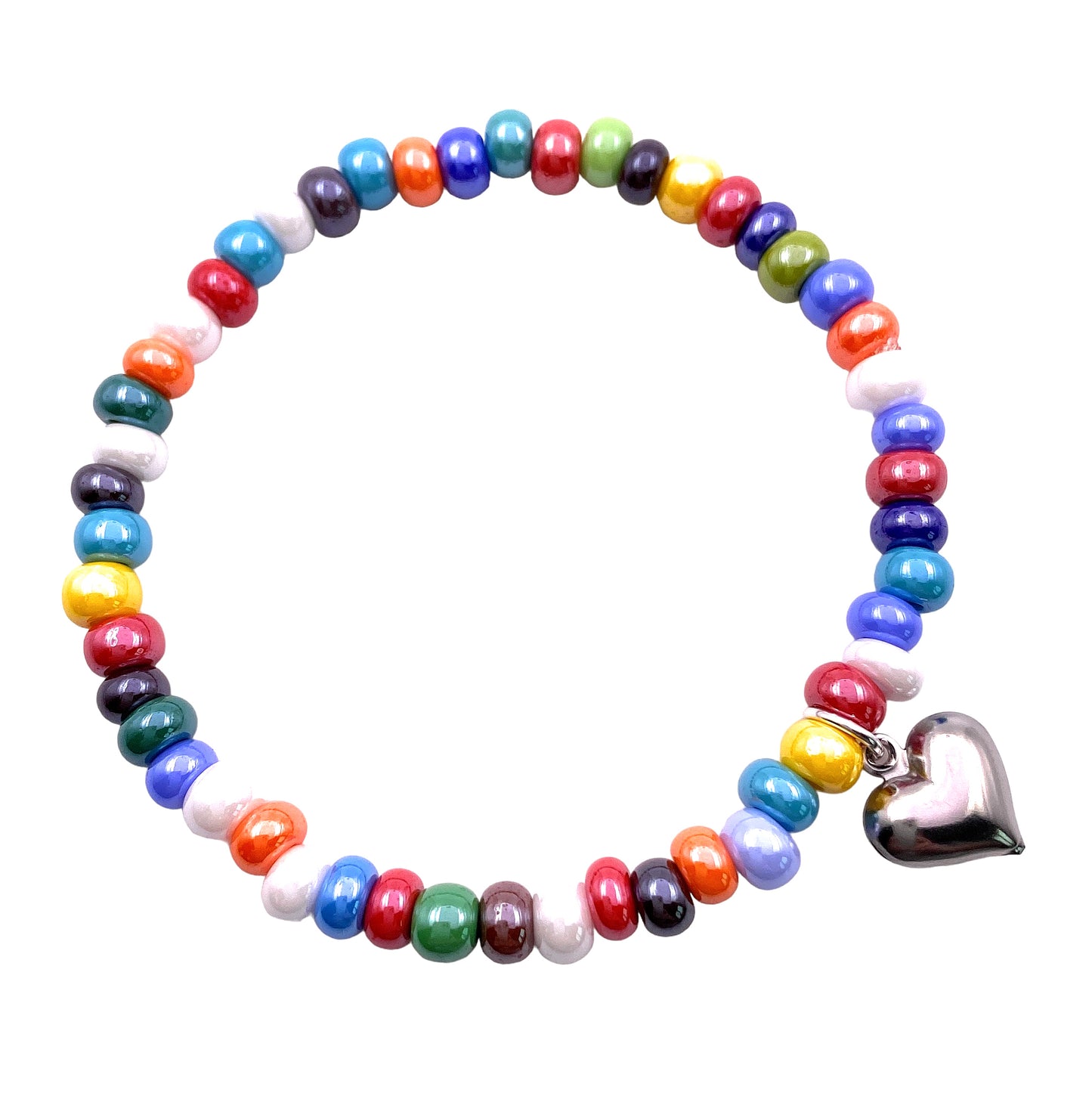 Introducing the Murano Passion's "Murano Glass Beaded Bracelet with Heart Charm" (MGBR7), this exquisite piece showcases dainty 5mm/0.5cm multi-coloured beads in a lively palette of red, blue, green, yellow, and white. Each bead is intricately arranged in a playful pattern and paired with a silver heart charm, capturing the essence of whimsical Murano glass designs. Elasticated for comfort, this handmade bracelet beautifully complements any style.