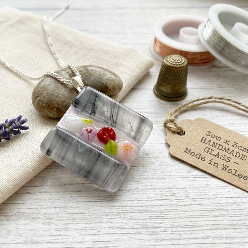 Handmade Glass Pendant made with Millefiori Glass Flowers - 3cm x 3cm (Grey) square pendant on a silver chain.