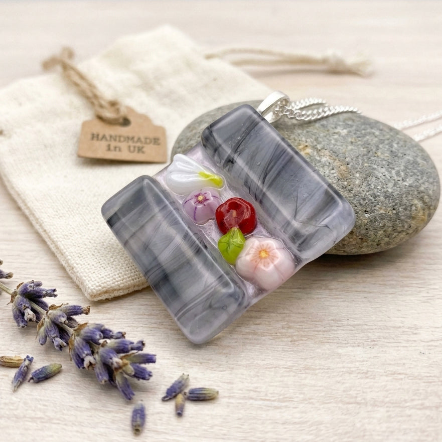 Handmade Glass Pendant made with Millefiori Glass Flowers - 3cm x 3cm (Grey), a square grey artisan piece on a silver chain.