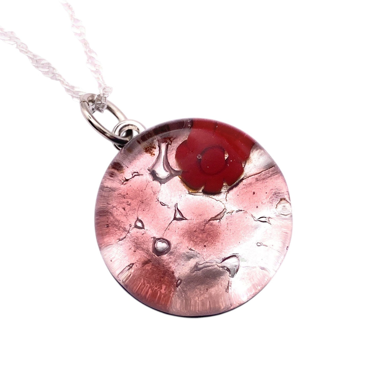 Murano Glass Round Pendant made with Millefiori Flowers - 2cm (MGPV19) in pink with a red flower design on a silver chain.
