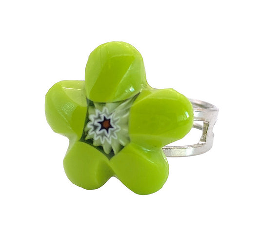 The Murano Passion Millefiori Flower Ring showcases a vibrant green flower-shaped design made from authentic Murano glass. In the center, you’ll find an intricate starburst pattern with black, white, and touches of brown. The minimalist silver-toned band elegantly highlights the carefully handcrafted glass flower in this 1.8cm masterpiece from Venice.