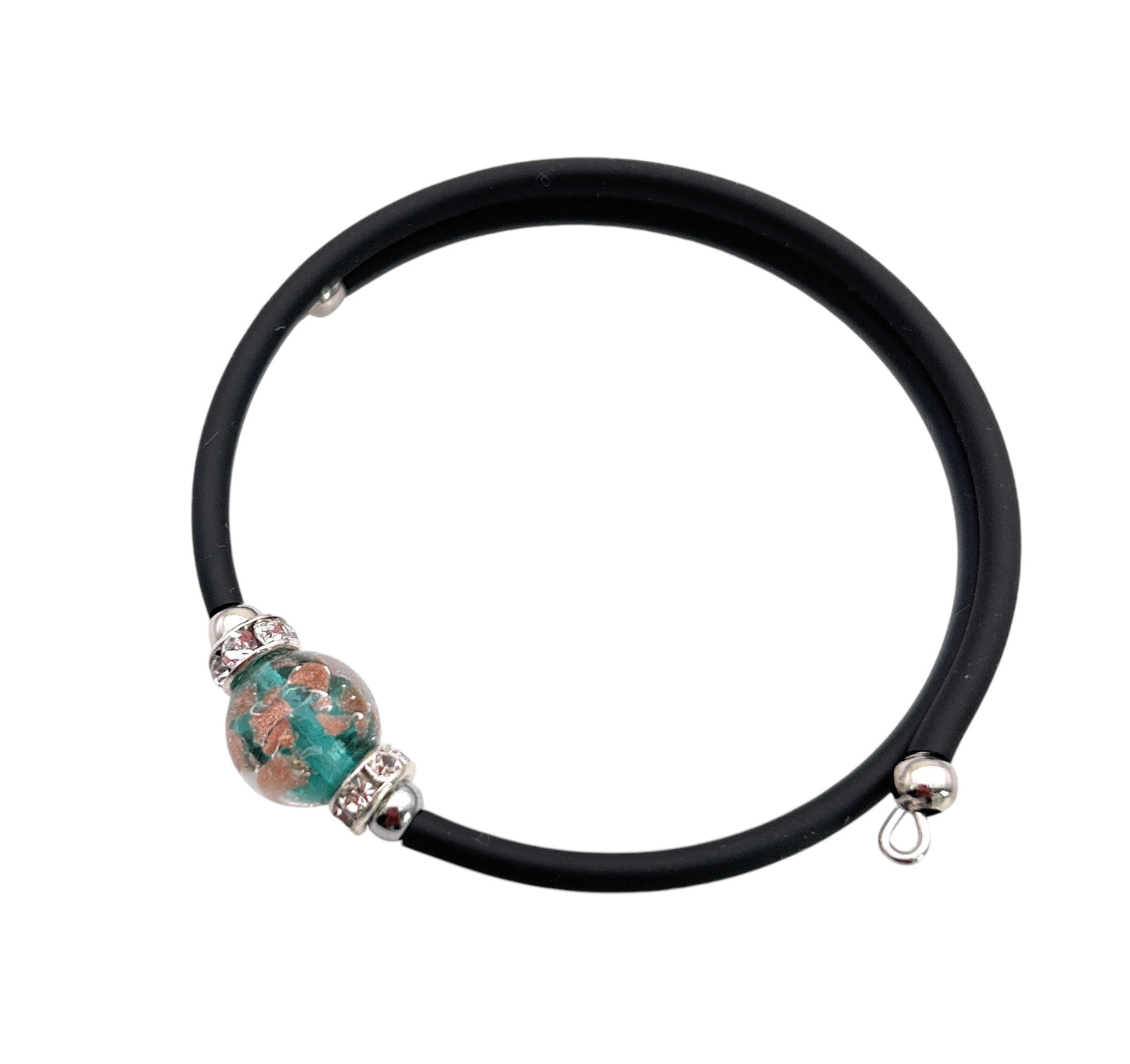 Introducing the Murano Passion handmade memory wire bracelet: a minimalist black bracelet highlighted by a 1cm Murano glass bead adorned with teal and copper flecks, complemented by small silver accents.