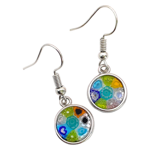 Introducing the Murano Glass Dropper Earrings by Murano Passion, showcasing Millefiori floral patterns in vibrant shades of blue, green, orange, and white. These colorful earrings feature round pendants with intricate designs and are complemented by simple yet elegant silver hooks. Made in Italy for a timeless charm.