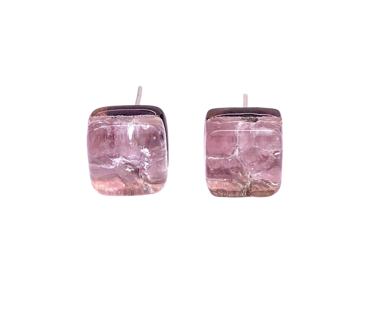 A pair of Murano Passion Murano Glass Earrings - Pale Pink/Silver, Dainty 8mm Diameter (MGE6), square-cut translucent pink studs against a white background. Handmade with polished surfaces, highlighting subtle color variations and elegance. Includes Certificate of Authenticity.