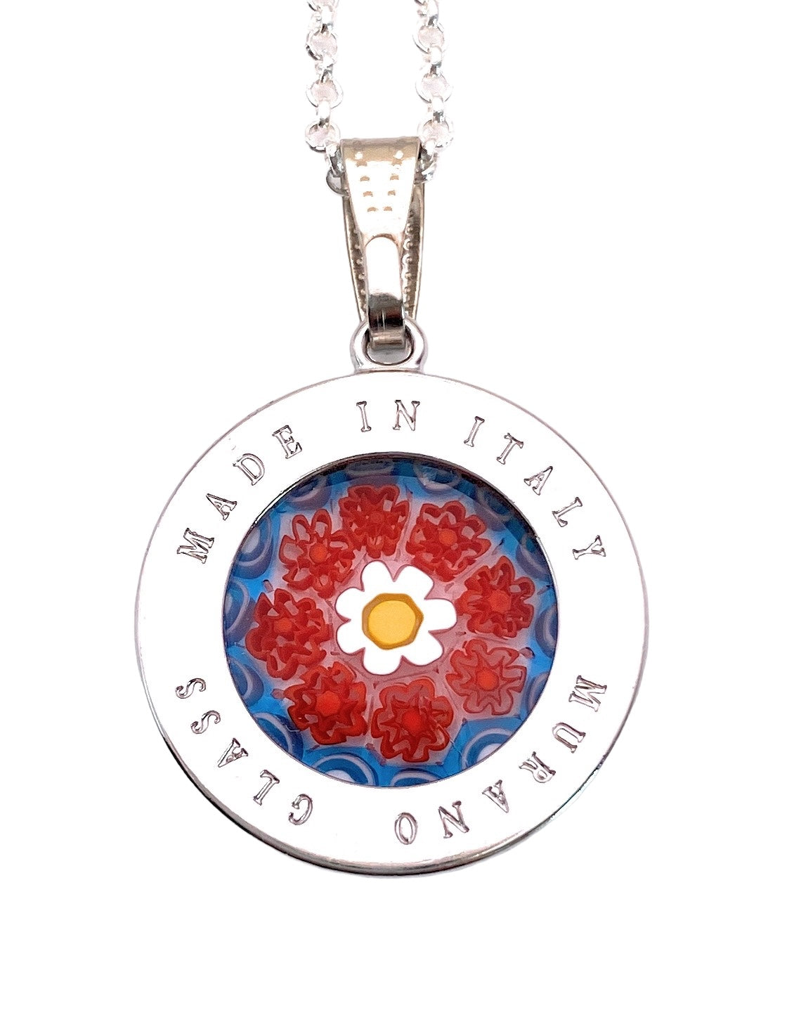 The Murano Passion Murano Glass Pendant made with Millefiori Flowers - 2.4cm beautifully embodies the heritage of Venetian artistry. It displays vibrant red and white floral patterns with a yellow-and-white center set against a blue backdrop, all elegantly encased in a silver frame engraved with "Made in Italy Murano Glass.