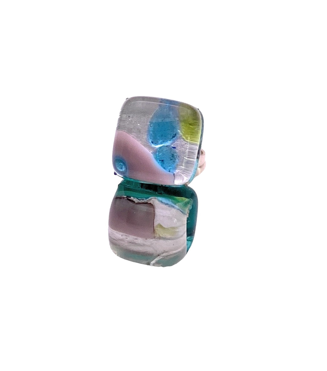 A pair of dainty 8mm Murano Glass Earrings from Murano Passion celebrates Venetian artistic heritage. The earrings feature vibrant swirls of pink, blue, and green alongside shades of teal and white—truly a masterpiece echoing the elegance of handmade Murano artistry.