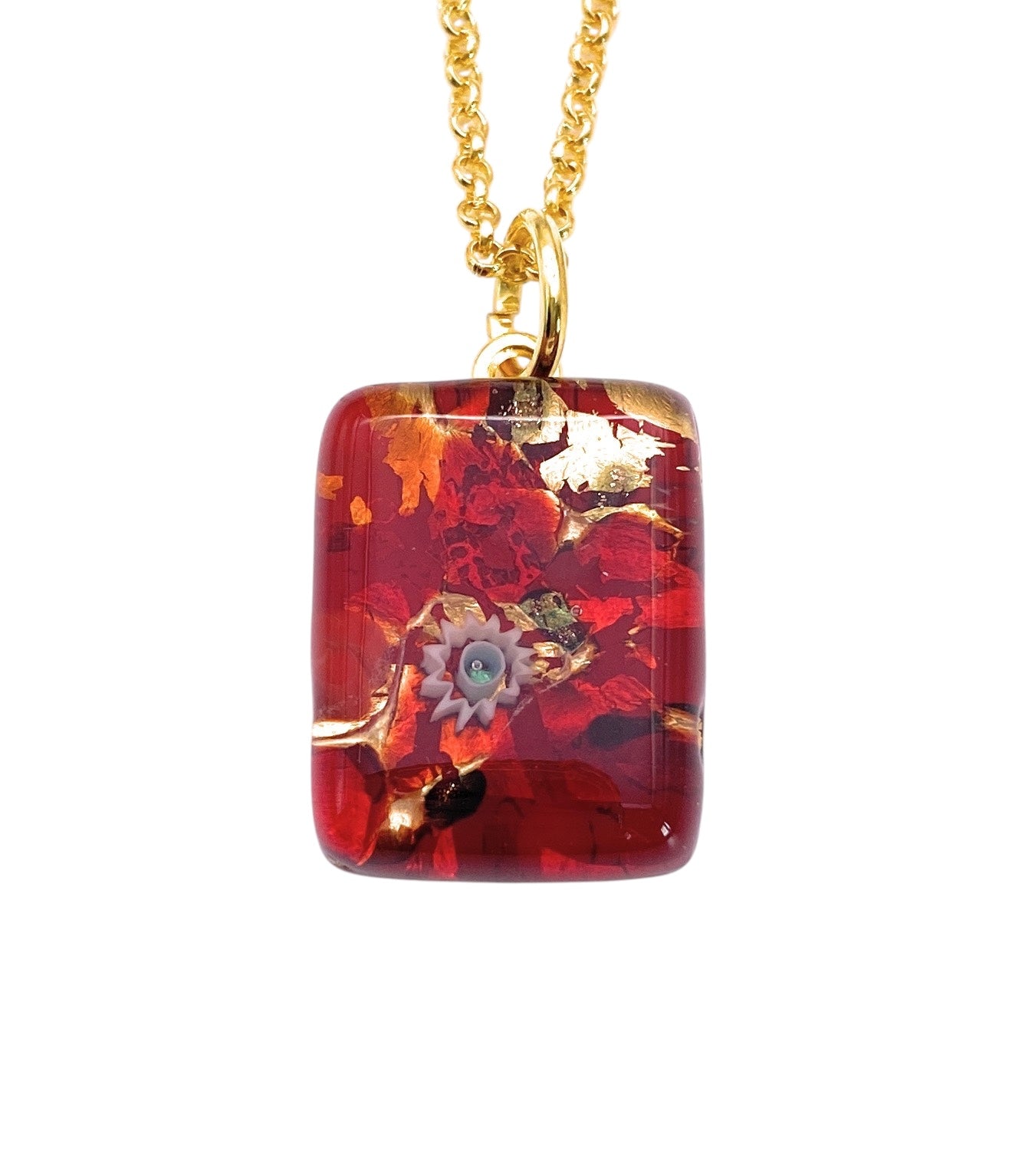 This beautiful gold chain from Murano Passion showcases the handmade Murano Glass Pendant, Multicolour on Gold Leaf - Dainty 2cm x 1.5cm (MGPP2). It features a rectangular shape with a glossy red background enhanced by gold and silver leaf, and is elegantly accented with a delicate flower detail at its center. A Certificate of Authenticity is included to ensure guaranteed quality.