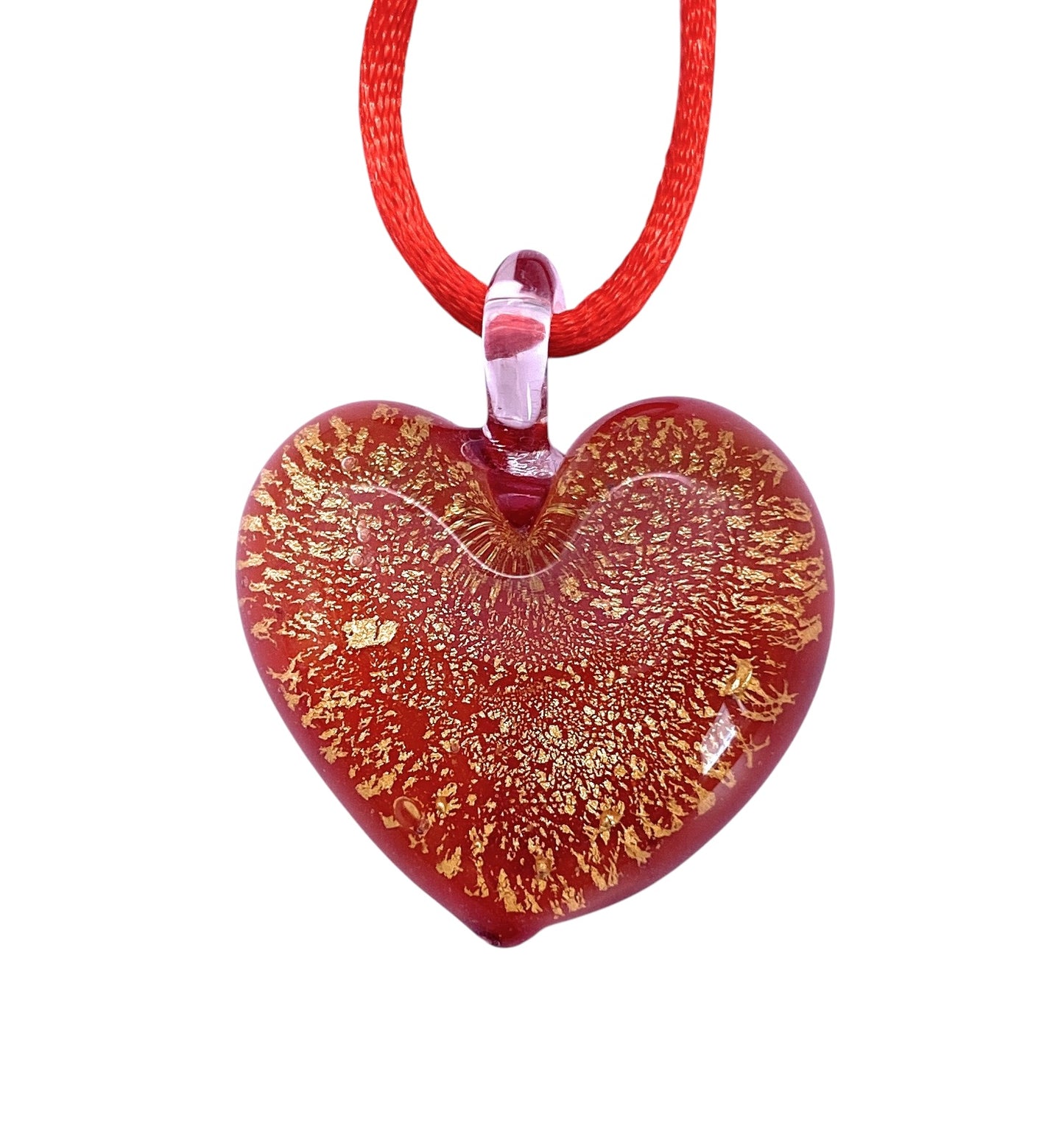 The Murano Passion 3cm Blown Glass Heart Pendant (MHT11) features a striking red Murano glass heart infused with shimmering gold flecks, elegantly suspended from a vibrant red cord.