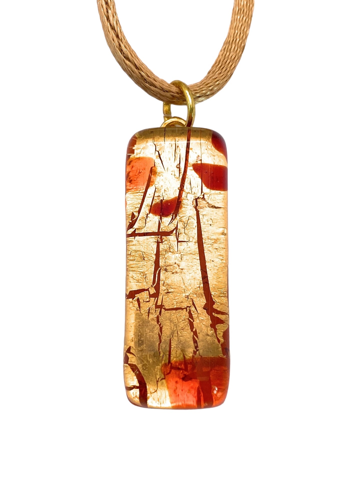 The Murano Passion pendant, crafted with an exquisite gold leaf finish, features a 3cm x 1cm size that hangs elegantly from a light brown cord necklace. With its timeless charm and burnt orange crackled design, this pendant comes complete with a Certificate of Authenticity and adds sophistication to any ensemble.