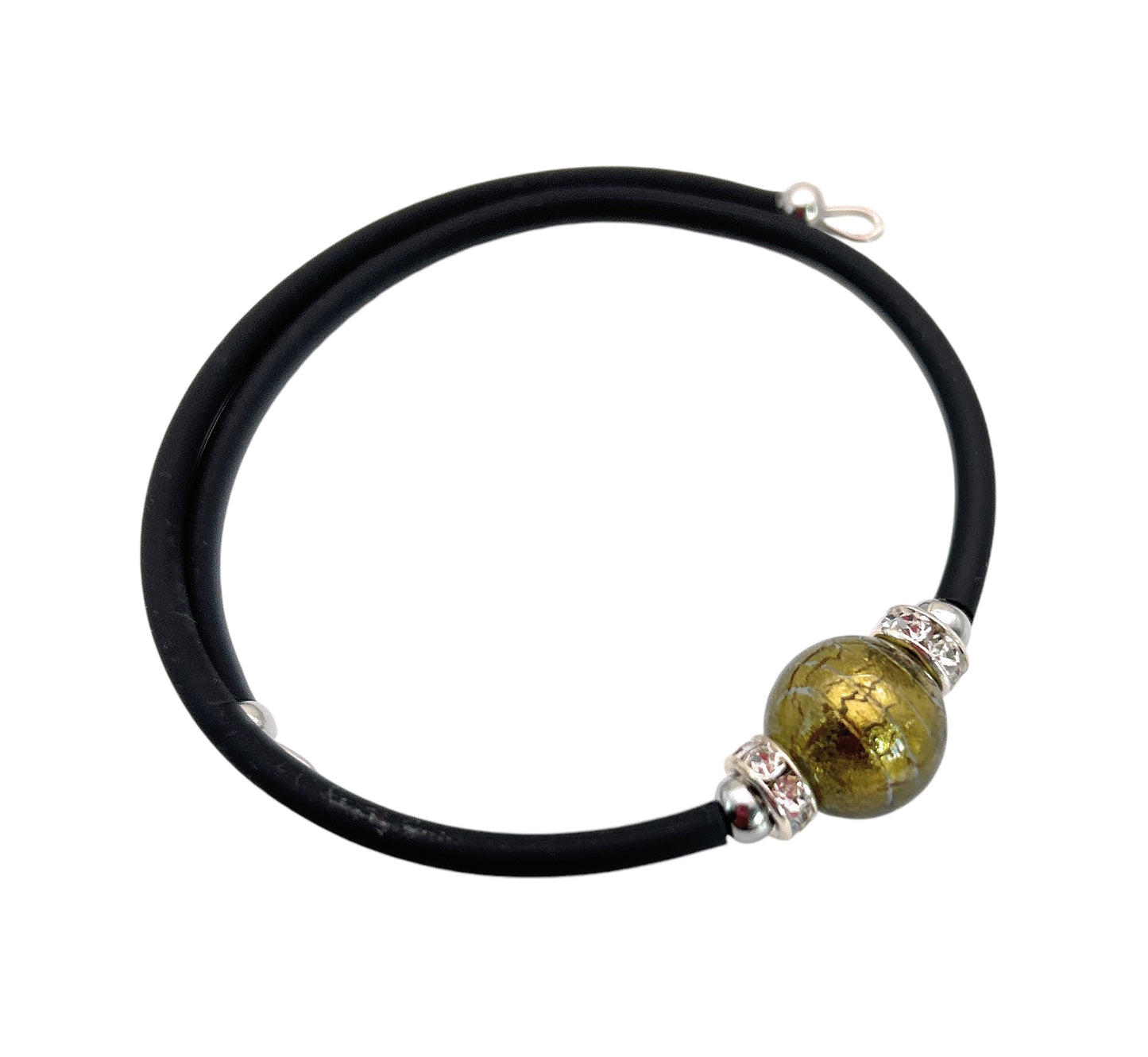 A handmade memory wire bracelet from Murano Passion, showcasing a prominent 1cm Murano Glass bead in green, is artfully complemented by two silver spacer accents on a black cord.