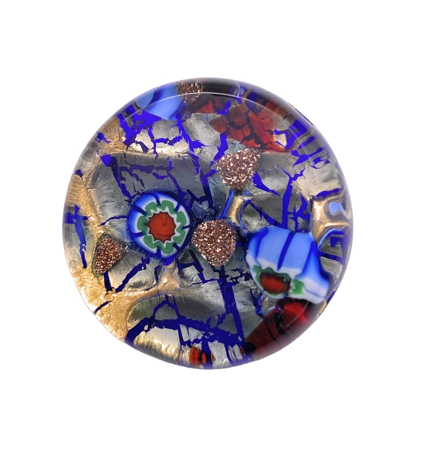 Introducing the Murano Glass Brooch with Millefiori on a Gold Leaf Base by Murano Passion: a round, multicolored glass paperweight that features intricate designs and evokes the charm of Venice, Italy. With its vibrant blue, gold, red, and green elements set in swirling patterns and fragmented textures, this piece captures the essence of handmade abstract art reminiscent of traditional Murano craftsmanship.