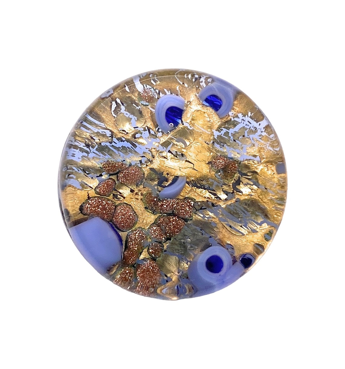 The Murano Passion Glass Brooch with Millefiori on a Gold Leaf Base features swirling blue and gold patterns adorned with brown speckled accents. Its translucent design captures the essence of Venetian artistry, delivering depth and texture reminiscent of this rich heritage.