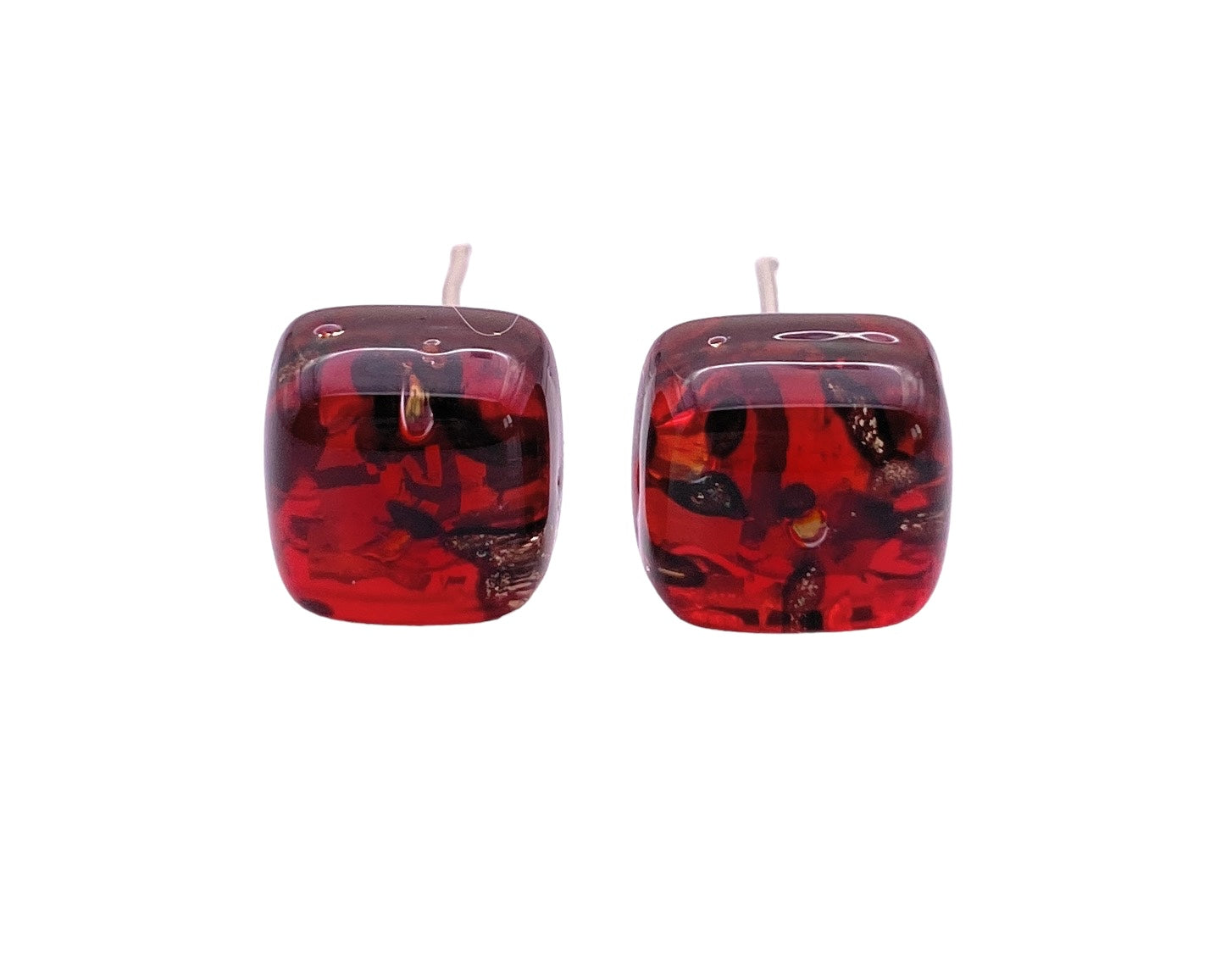 Introducing the Murano Passion - Murano Glass Earrings (Red/Gold), an exquisite pair of square-shaped earrings crafted from authentic Murano glass. These dainty 8mm diameter earrings feature a captivating marbled texture and a glossy sheen, standing out beautifully against a white backdrop.