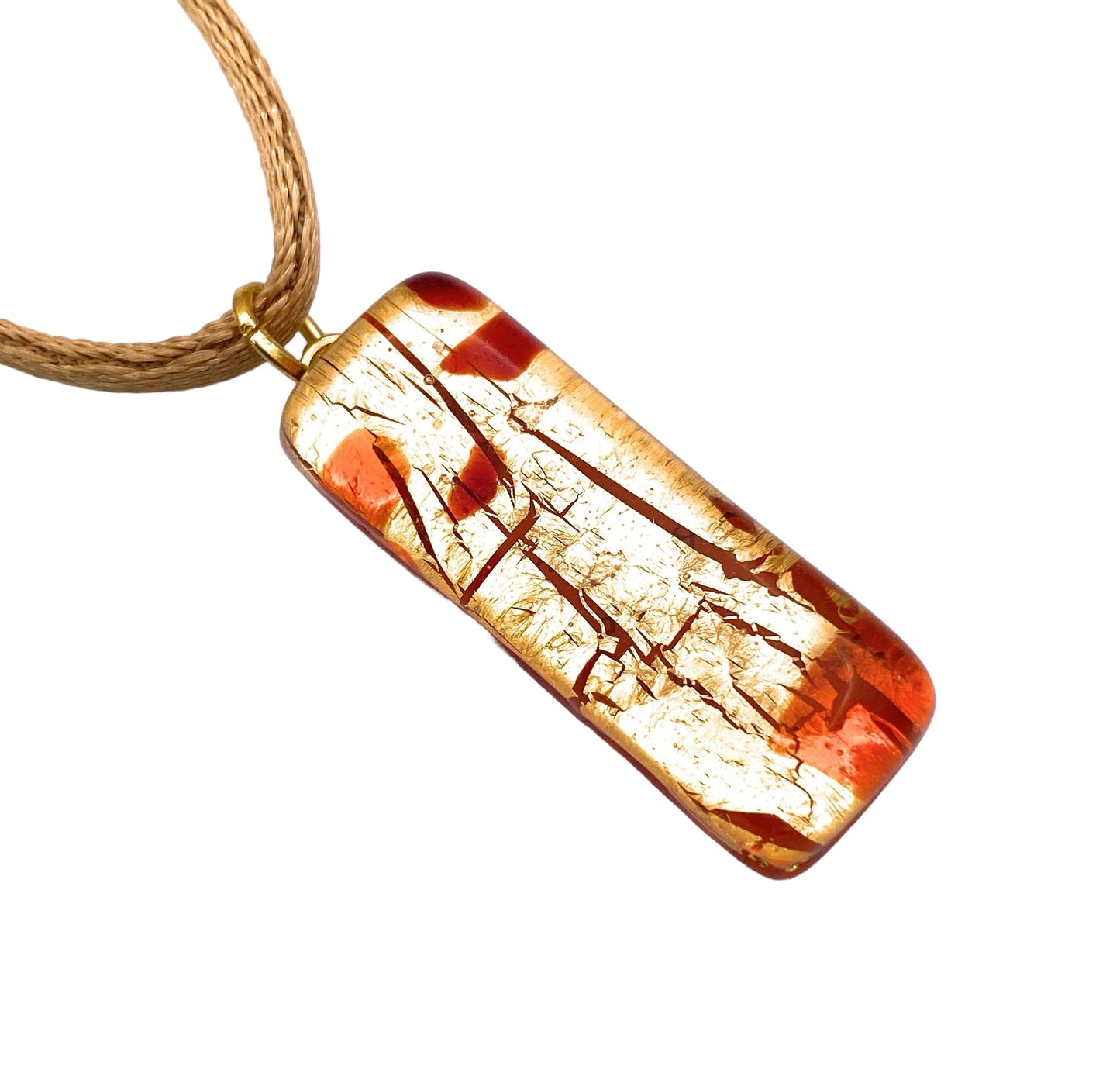 The Murano Passion MGPL7 Murano Glass Pendant showcases a rectangular design with amber and cream-colored patterns reminiscent of cracked marble. It is elegantly suspended on a light brown cord with a gold attachment, and its glossy finish accentuates the intricate craftsmanship, exemplifying both elegance and authenticity.