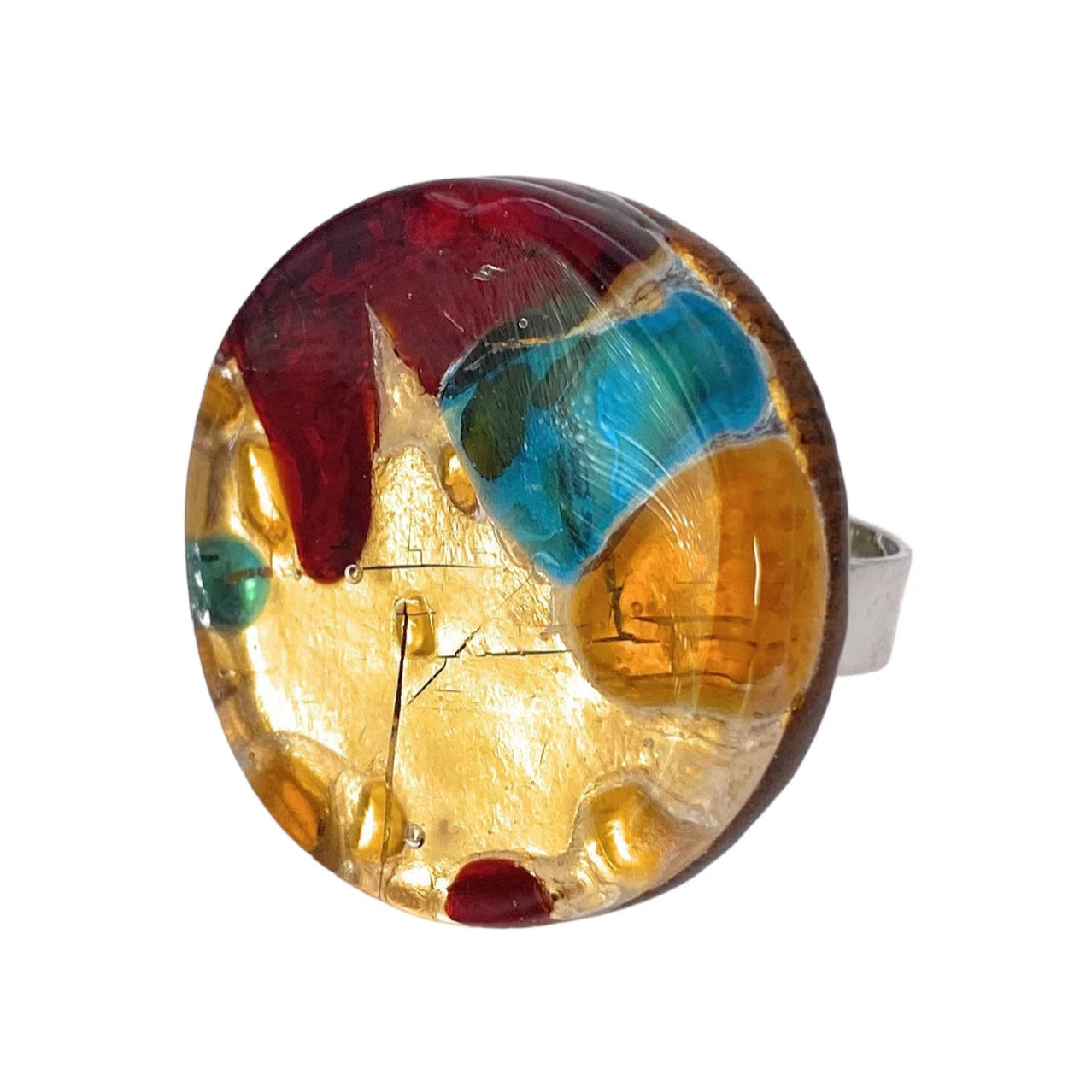 This vibrant and bold 3cm Murano Glass Ring, Chunky Statement Ring from Murano Passion showcases a glossy finish with colors like red, blue, yellow, and amber. Crafted from Genuine Murano Glass on a metallic band, it reflects Venetian artistic heritage in a round abstract design.