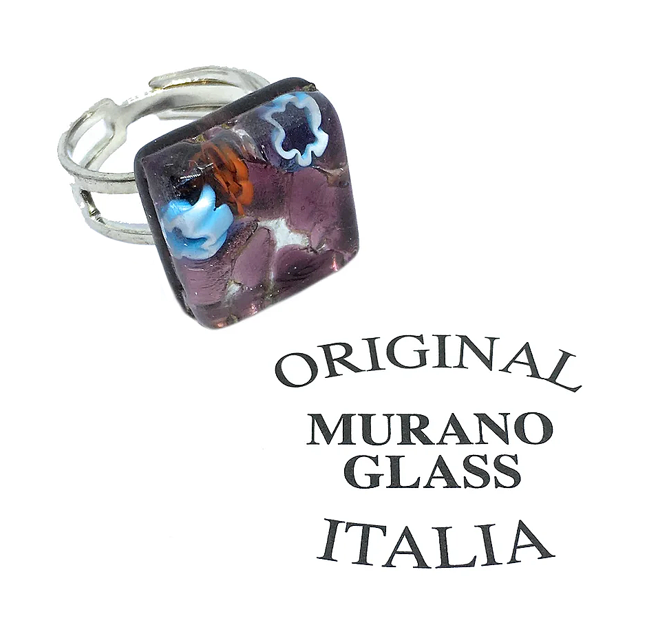 The *Murano Glass Ring, Millefiori Ring on Silver Leaf - Dainty 1.5cm* by *Murano Passion* features a captivating purple square design embellished with intricate blue and white flowers on a silver band. The inscription "Original Murano Glass Italia" attests to its handcrafted origin in Venice.