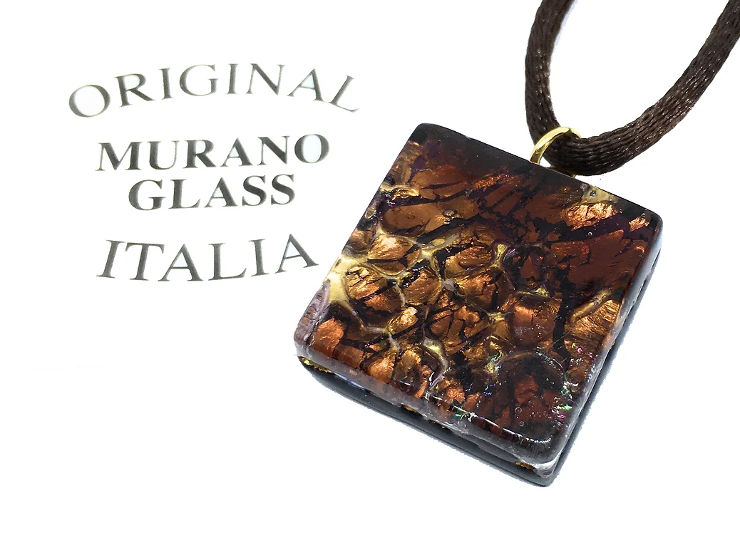 Murano Passion pendant, featuring a square Murano glass design with rich amber and brown crackled patterns, elegantly hangs on a dark cord. The text reads: "Original Murano Glass Italia." This piece includes a Certificate of Authenticity to confirm the genuineness of your Murano Glass Jewellery.