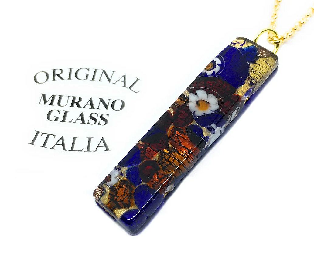 A radiant rectangular Murano Passion Glass Pendant, measuring 4cm x 1cm, features intricate floral patterns and gold accents on a gold chain. The text "Original Murano Glass Italia" is inscribed, showcasing the exquisite craftsmanship of Murano Glass Jewellery.