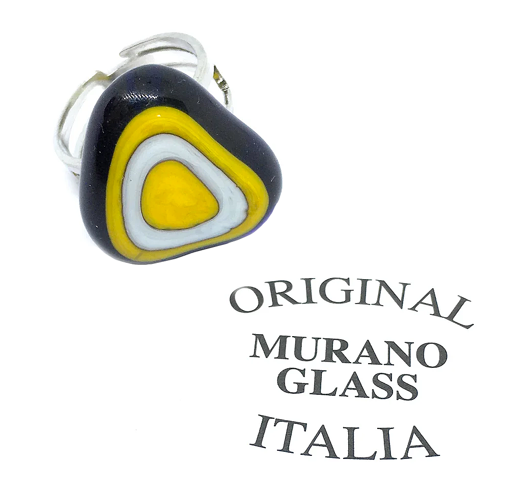 Explore the exquisite Murano Passion Glass Ring, an abstract design showcasing mesmerizing concentric layers of dark blue, yellow, and white set against a pristine backdrop. This authentic piece, handmade in Venice, features the text "Original Murano Glass Italia" and measures 2cm x 1.8cm.