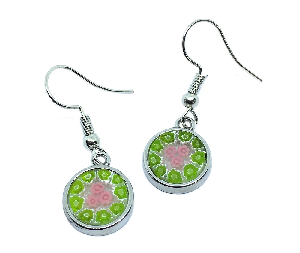 The stunning Murano Passion earrings showcase intricate green and pink floral patterns set in circular, silver-colored designs. These Millefiori Earrings, with a 1.2cm diameter, are reminiscent of Murano Glass creations and feature artfully symmetrical designs with easy-to-wear hooks.