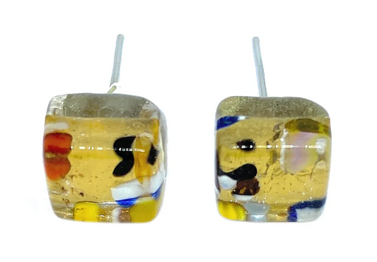 The Murano Passion "Murano Glass Earrings, Millefiori on Gold Leaf" feature a dainty 8mm design with vibrant hues of yellow, blue, black, red, and white beautifully embedded within translucent handmade glass.