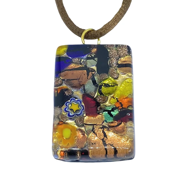 The Murano Passion glass pendant, named "Millefiori on Gold Leaf," elegantly displays a stunning abstract design with vibrant yellow, blue, and copper hues intertwined with floral patterns. This piece gracefully hangs from a brown cord and is accompanied by a Certificate of Authenticity.