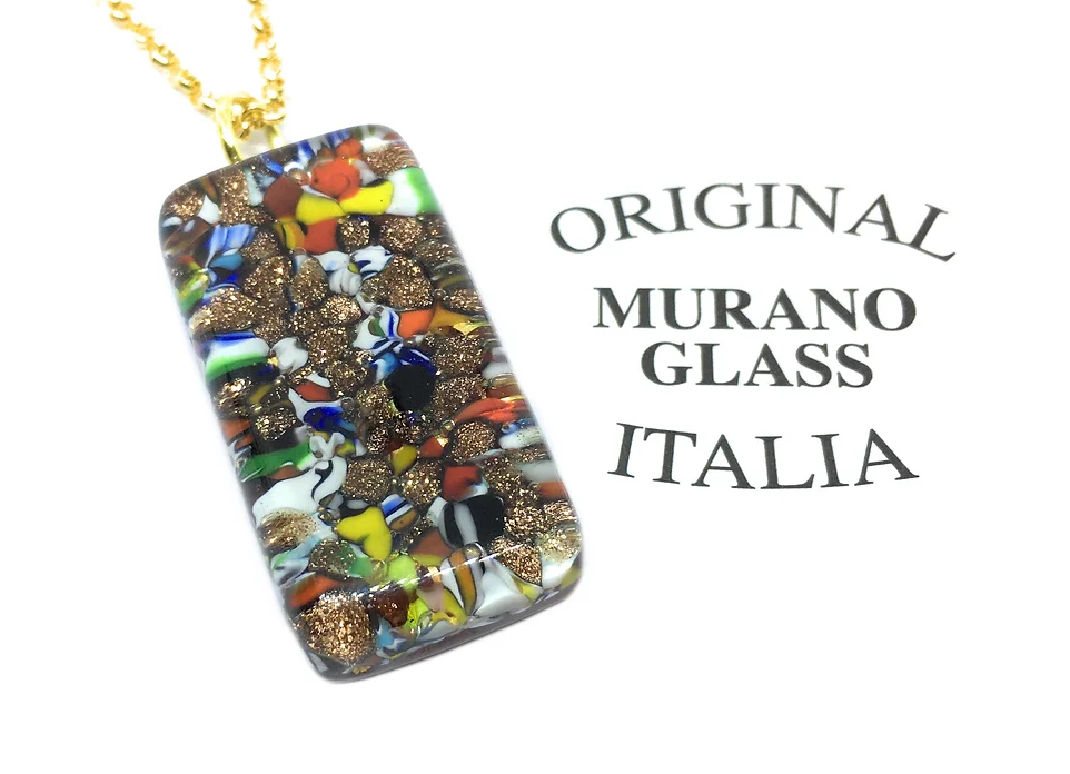 The Murano Passion Millefiori Pendant with Gold Leaf, measuring 3cm x 1.5cm, features vibrant Murano glass adorned with gold flecks and elegantly hangs from a gold chain. The side bears the "Original Murano Glass Italia" hallmark, and it comes with a Certificate of Authenticity for your peace of mind.