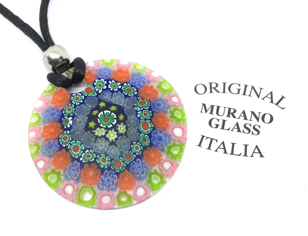 A vibrant Murano Passion glass pendant crafted with intricate Millefiori flowers in shades of blue, green, red, and pink is paired with a black cord. To the right is the text "Original Murano Glass Italia.