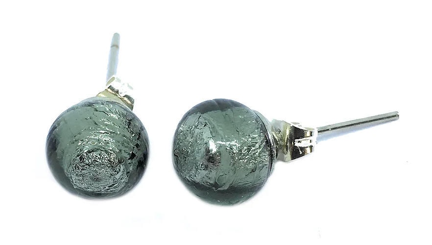 A pair of Murano Passion earrings features 8mm dark silver/grey Murano Glass spherical beads on silver posts set against a white background.