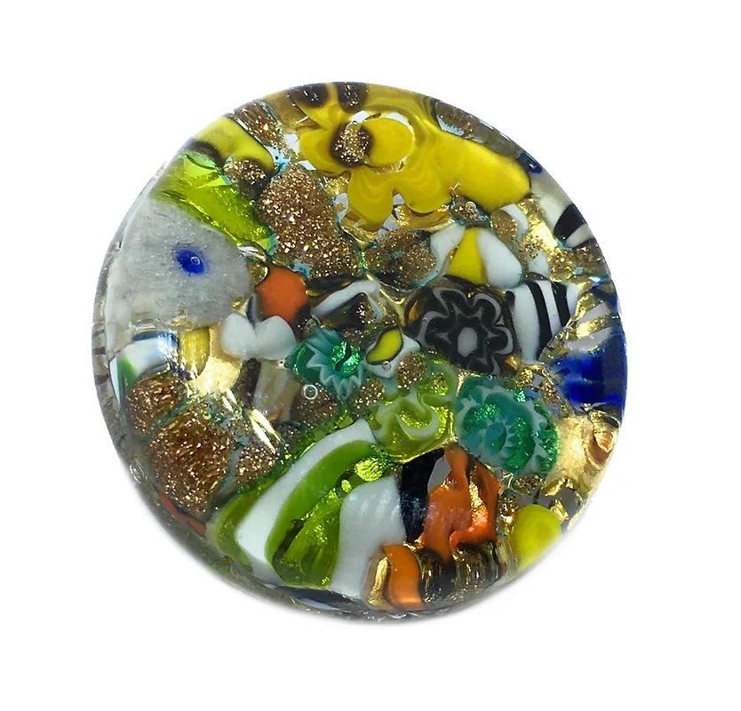 The Murano Passion brooch, made from Murano Glass, features a gold leaf base and intricate swirled patterns in blue, green, orange, yellow, and gold accents set against a clear design.