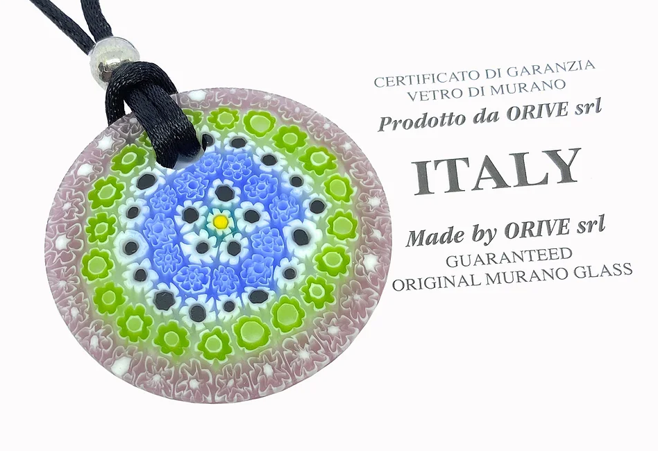 The Murano Passion pendant showcases a stunning 4cm diameter round design, crafted with Millefiori flowers in vibrant blue, green, white, and pink hues on a black cord. It comes with an ORIVE srl certificate to confirm its genuine Italian origin from the celebrated Venetian artistic tradition.