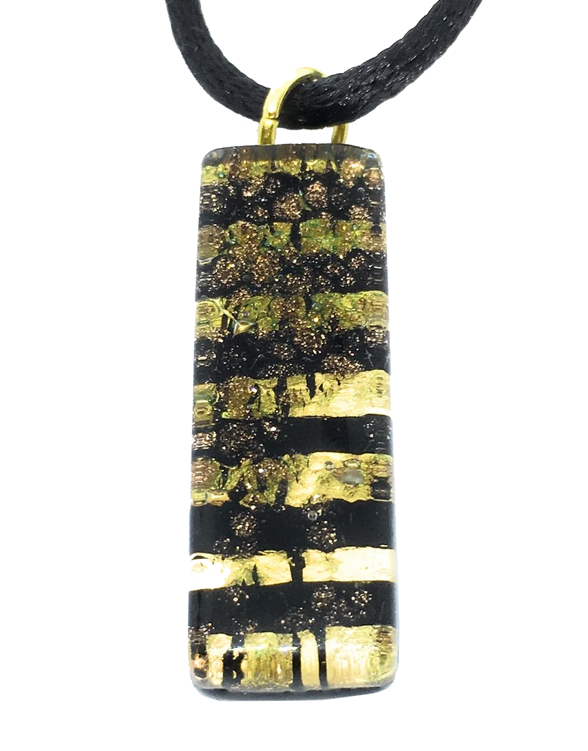 The Murano Passion Murano Glass Pendant with Gold Leaf, measuring 3cm x 1cm, hangs elegantly from a black cord. This rectangular pendant features a black and gold striped pattern and boasts a glossy finish, with the gold stripes having a textured appearance that highlights its exquisite craftsmanship.